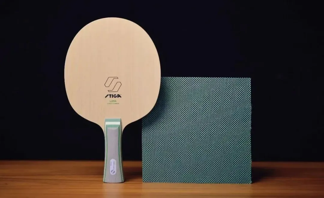 STIGA LUMA carbon blade overview with green aramid carbon handle lines visible