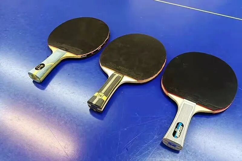 Recreational table tennis player looking tired and unfocused during a late evening session