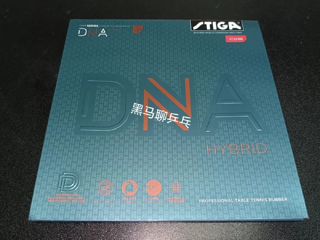 Stiga DNA Hybrid XH rubber sheet at 49.3g showing lightly-tacky topsheet surface
